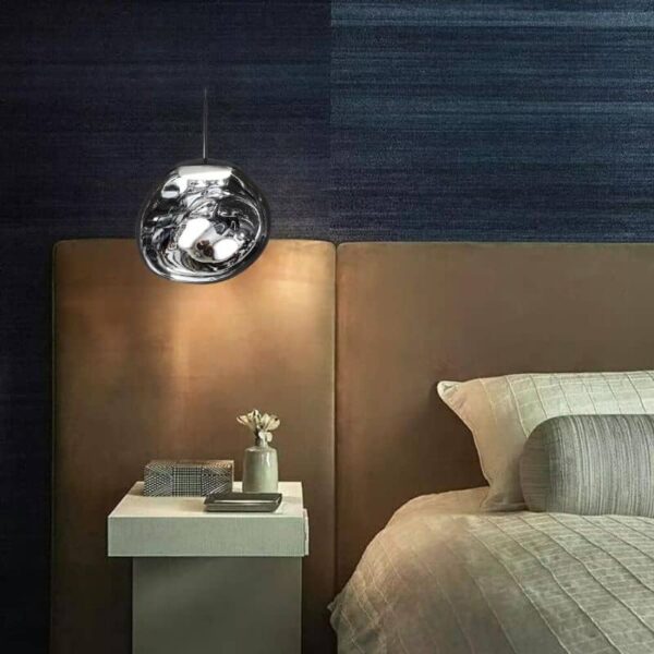 Suspension luminaire asymétrique aux courbes fluides