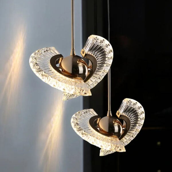 Eigentijdse roterende hanglamp met gouden afwerking